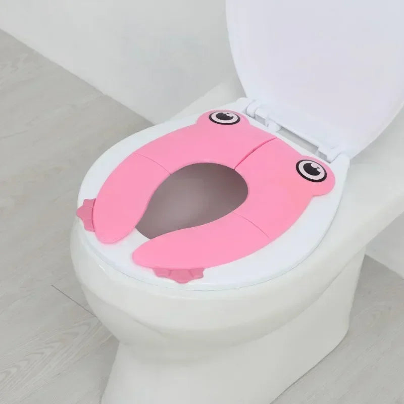 TravelPotty Fold-N-Go Kids Training Potty – Portable Collapsible Toddler Toilet Seat with Cartoon Design (Compact Travel Size)